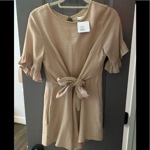 Beige romper w/ tags still on